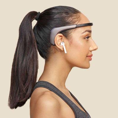 Woman wearing a Muse EEG headset